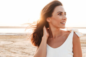 Close up of a beautiful young woman wearing summer dress